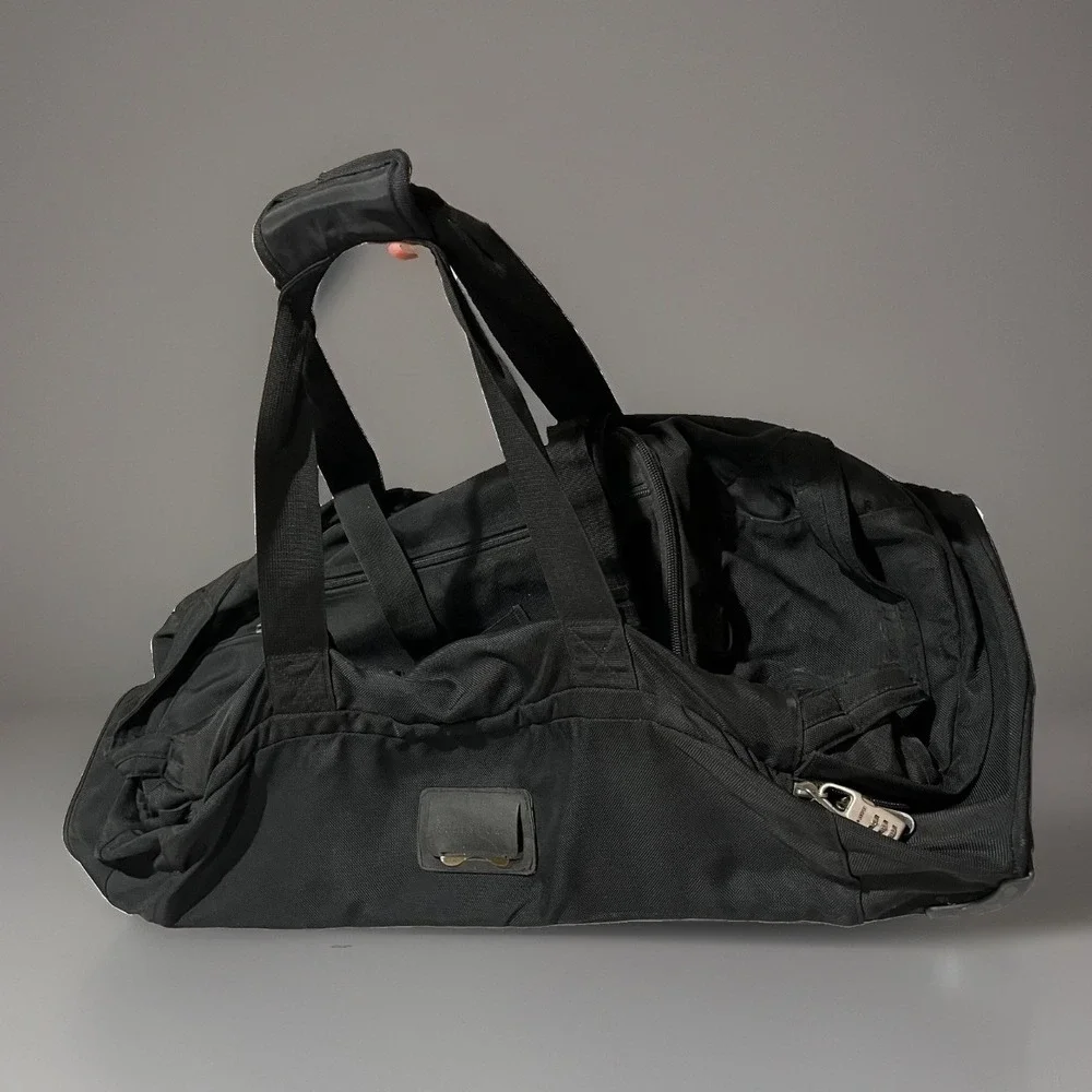 Jansport Black Heavy Duty Zipper Wheeled Utility Rolling Duffle Travel Bag XL